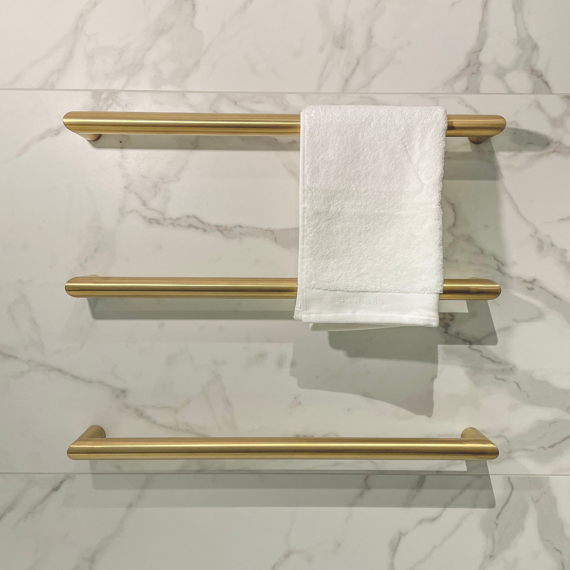 ROUND 632MM HEATED TOWEL RAIL BRUSHED BRASS