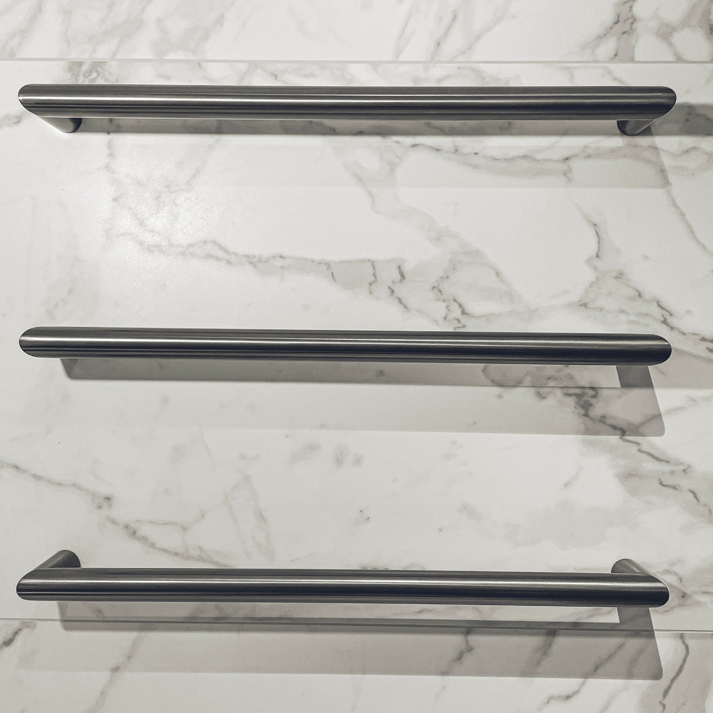 ROUND 632MM HEATED TOWEL RAIL GUNMETAL